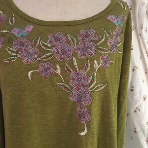 Beautiful green with peacock filigree on front long sleeve size large